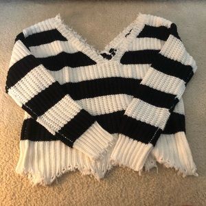 Black and white striped distressed sweater